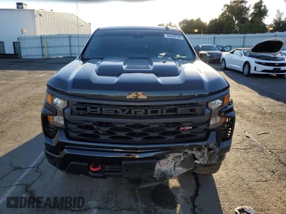 2024 Chevrolet Silverado 1500 Custom Trail Boss z VIN 3GCUDCE83RG218772, wystawiony jako Copart lot #44648145 z przebiegiem 8 672 mil mil oraz Szkoda całkowita • Salvage title. Historia ofert i sprzedaży dostępna na DreamBid. Obrazek 5.