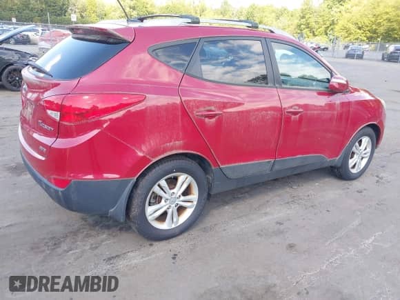 2013 Hyundai Tucson GLS z VIN KM8JUCAC6DU584112, wystawiony jako IAAI lot #43236532 z przebiegiem 106 442 mil mil oraz . Historia ofert i sprzedaży dostępna na DreamBid. Obrazek 4.