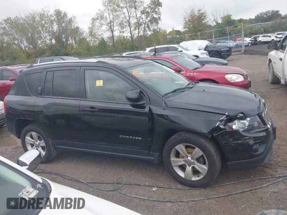 2015 Jeep Compass Latitude with VIN 1C4NJCEB6FD418613, listed as a IAAI auction lot 43309792 with 113,088 mi miles and . Bid and sale history available at DreamBid. Image 14.