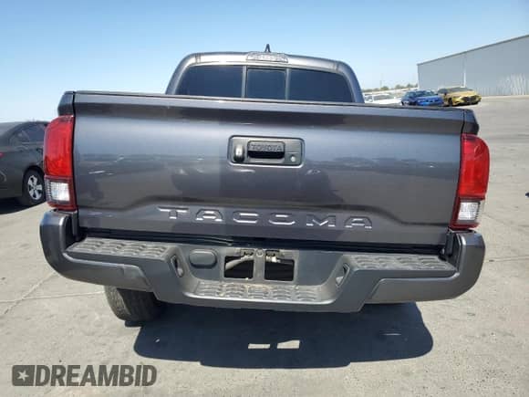 2021 Toyota Tacoma SR с VIN 3TYAX5GN2MT031532, выставлен на аукционе Copart как лот 81696855 с пробегом 23 073 миль миль и Списание • Salvage title. История ставок и продаж доступна на DreamBid. Изображение 6.