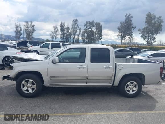 2010 Chevrolet Colorado 1LT z VIN 1GCDSCDE5A8148912, wystawiony jako IAAI lot #41752099 z przebiegiem Nie podano mil oraz . Historia ofert i sprzedaży dostępna na DreamBid. Obrazek 14.