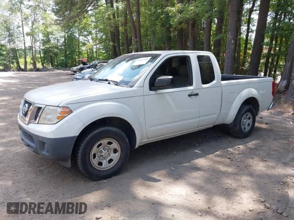 2014 Nissan Frontier S with VIN 1N6BD0CT8EN720771, listed as a IAAI auction lot 42611210 with 186,707 mi miles and . Bid and sale history available at DreamBid. Image 2.
