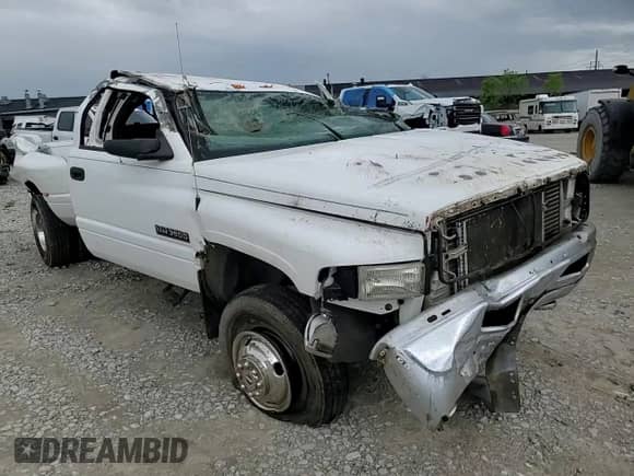 2002 Dodge 3500 с VIN 3B7MF33632M239639, выставлен на аукционе Copart как лот 55339375 с пробегом Не указан миль и Списание • Salvage title. История ставок и продаж доступна на DreamBid. Изображение 14.