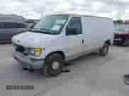 1999 Ford Econoline Cargo with VIN 1FTRE14W0XHB13200, listed as a IAAI auction lot 43476403 with 231,941 mi miles and . Bid and sale history available at DreamBid. Image 2.