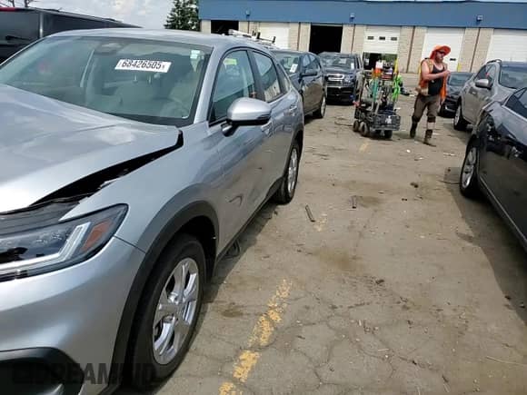 2023 Honda HR-V LX z VIN 3CZRZ2H34PM733581, wystawiony jako Copart lot #68426505 z przebiegiem Nie podano mil oraz Czysty tytuł • Clean title. Historia ofert i sprzedaży dostępna na DreamBid. Obrazek 13.