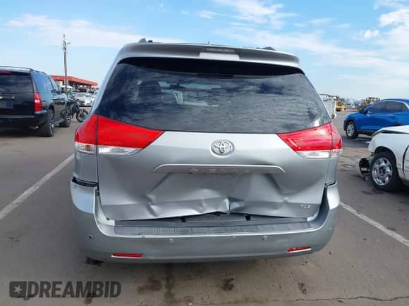 2011 Toyota Sienna XLE with VIN 5TDYK3DC7BS006817, listed as a IAAI auction lot 43410453 with 151,210 mi miles and . Bid and sale history available at DreamBid. Image 6.