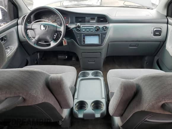 2004 Honda Odyssey LX with VIN 5FNRL18574B137609, listed as a Copart auction lot 68292805 with 172,873 mi miles and Salvage title. Bid and sale history available at DreamBid. Image 8.