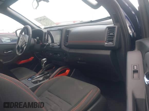 2023 Nissan Frontier Pro-4X with VIN 1N6ED1EK6PN657874, listed as a IAAI auction lot 42947903 with 1,924 mi miles and . Bid and sale history available at DreamBid. Image 5.