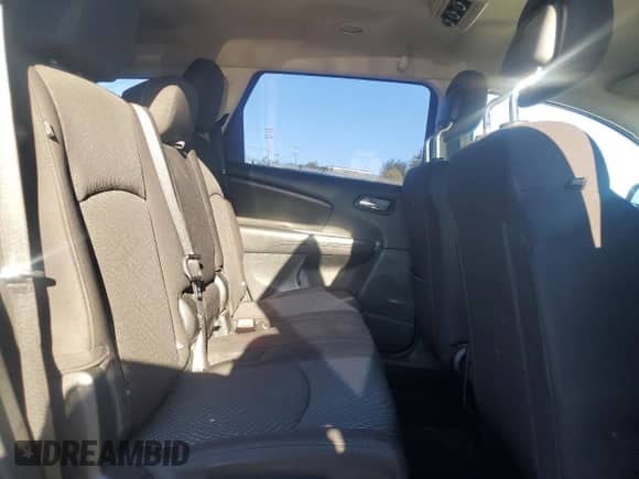 2013 Dodge Journey American Value с VIN 3C4PDCAB1DT722347, выставлен на аукционе Copart как лот 87449465 с пробегом 169 855 миль миль и Чистый • Clean title. История ставок и продаж доступна на DreamBid. Изображение 11.