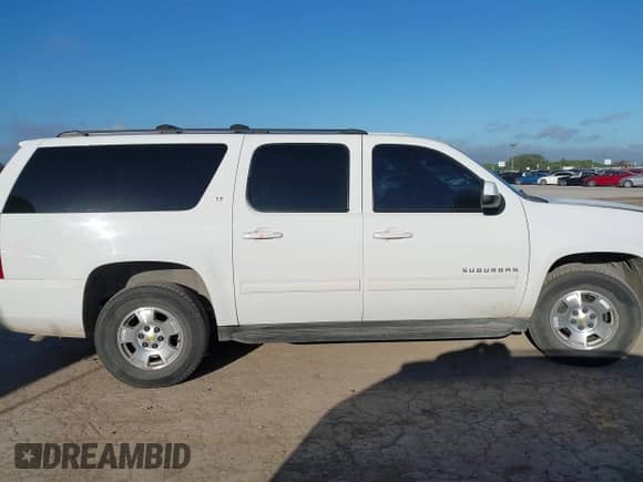 2011 Chevrolet Suburban LT z VIN 1GNSCJE05BR388248, wystawiony jako IAAI lot #42617677 z przebiegiem 247 514 mil mil oraz . Historia ofert i sprzedaży dostępna na DreamBid. Obrazek 13.