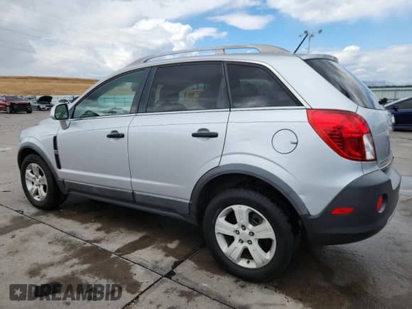 2013 Chevrolet Captiva Sport LS z VIN 3GNAL2EK4DS575807, wystawiony jako Copart lot #70582025 z przebiegiem 113 236 mil mil oraz Szkoda całkowita • Salvage title. Historia ofert i sprzedaży dostępna na DreamBid. Obrazek 2.
