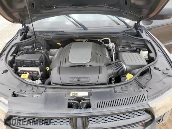 2013 Dodge Durango R/T with VIN 1C4SDHCT3DC697685, listed as a Copart auction lot 66028745 with 148,454 mi miles and Salvage title. Bid and sale history available at DreamBid. Image 12.