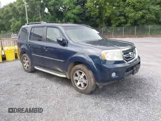 2009 Honda Pilot Touring with VIN 5FNYF48879B037564, listed as a IAAI auction lot 42683848 with 197,897 mi miles and . Bid and sale history available at DreamBid. Image 1.