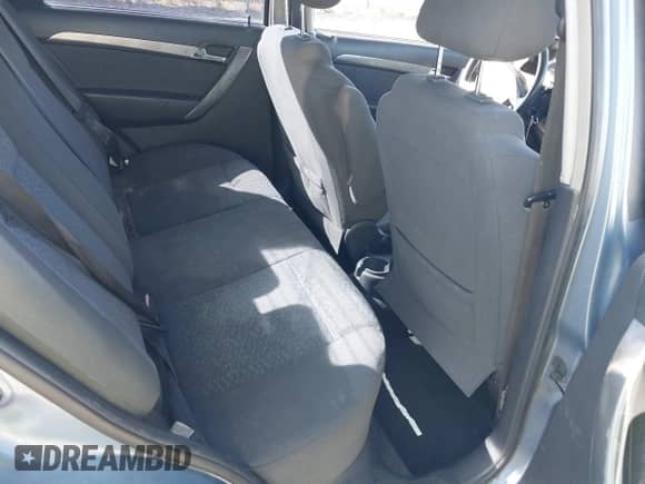 2007 Chevrolet Aveo LT z VIN KL1TG56647B152077, wystawiony jako IAAI lot #42170944 z przebiegiem 217 705 mil mil oraz . Historia ofert i sprzedaży dostępna na DreamBid. Obrazek 8.