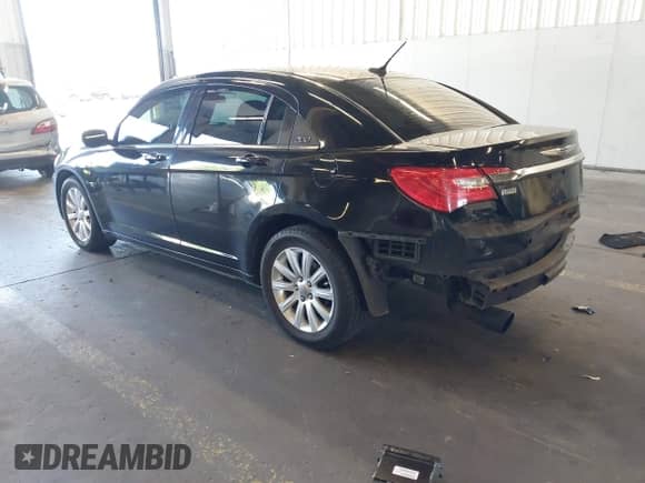 2013 Chrysler 200 Touring with VIN 1C3CCBBG3DN658712, listed as a IAAI auction lot 43237507 with 140,185 mi miles and . Bid and sale history available at DreamBid. Image 3.