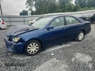 2005 Toyota Camry LE с VIN 4T1BE32K15U401465, выставлен на аукционе Copart как лот 84410985 с пробегом 124 241 миль миль и Списание • Salvage title. История ставок и продаж доступна на DreamBid. Изображение 1.