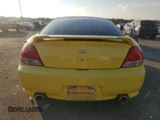 2006 Hyundai Tiburon GT с VIN KMHHN65FX6U202815, выставлен на аукционе Copart как лот 88673255 с пробегом Не указан миль и Списание • Salvage title. История ставок и продаж доступна на DreamBid. Изображение 6.