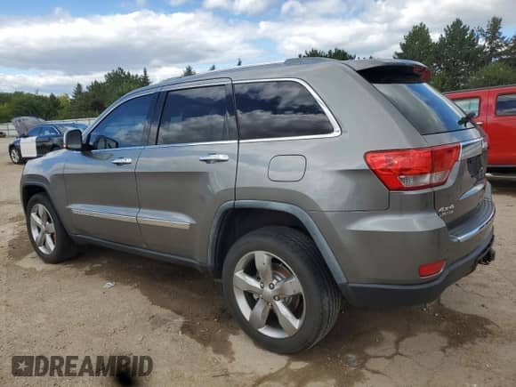 2012 Jeep Grand Cherokee Limited z VIN 1C4RJFBG5CC102608, wystawiony jako Copart lot #70375545 z przebiegiem 103 079 mil mil oraz Szkoda całkowita • Salvage title. Historia ofert i sprzedaży dostępna na DreamBid. Obrazek 2.