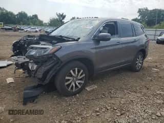 2020 Honda Pilot EX-L z VIN 5FNYF6H5XLB028351, wystawiony jako Copart lot #68930775 z przebiegiem Nie podano mil oraz Szkoda całkowita • Salvage title. Historia ofert i sprzedaży dostępna na DreamBid. Obrazek 1.