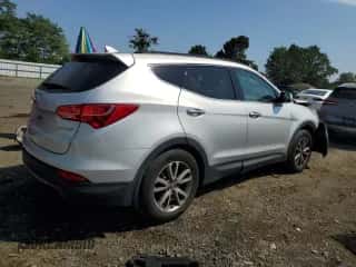 2014 Hyundai Santa Fe z VIN 5XYZU3LA6EG141870, wystawiony jako Copart lot #89644685 z przebiegiem 136 917 mil mil oraz Czysty tytuł • Clean title. Historia ofert i sprzedaży dostępna na DreamBid. Obrazek 3.