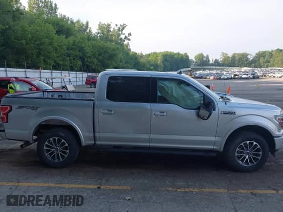 2019 Ford F-150 XLT z VIN 1FTEW1EP6KKD95650, wystawiony jako IAAI lot #42834163 z przebiegiem 100 460 mil mil oraz . Historia ofert i sprzedaży dostępna na DreamBid. Obrazek 13.