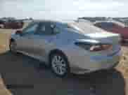 2021 Toyota Camry LE z VIN 4T1R11AK8MU455540, wystawiony jako Copart lot #82185805 z przebiegiem 16 292 mil mil oraz Szkoda całkowita • Salvage title. Historia ofert i sprzedaży dostępna na DreamBid. Obrazek 2.