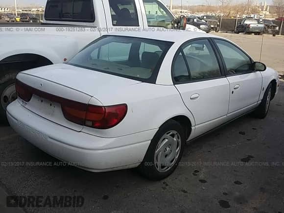 2001 Saturn SL with VIN 1G8ZK52781Z351108, listed as a IAAI auction lot 19251283 with 241,448 mi miles and . Bid and sale history available at DreamBid. Image 4.