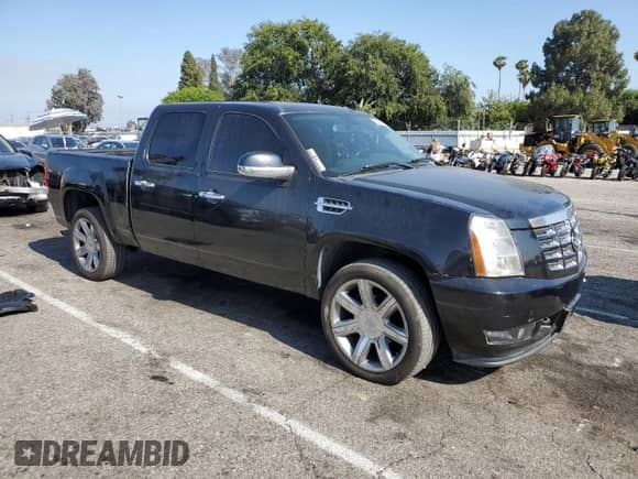 2009 GMC Sierra 1500 with VIN 2GTEC230691130743, listed as a Copart auction lot 60643155 with 140,455 mi miles and Salvage title. Bid and sale history available at DreamBid. Image 4.