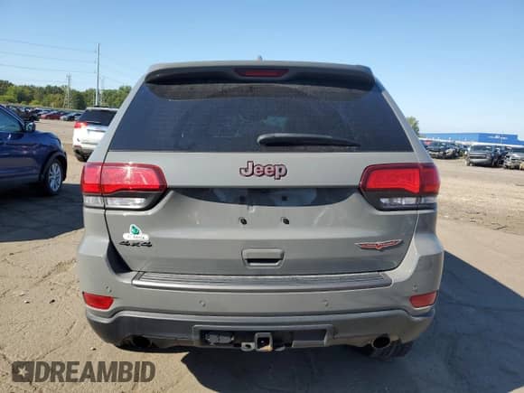 2021 Jeep Grand Cherokee Trailhawk z VIN 1C4RJFLG5MC770179, wystawiony jako Copart lot #71072165 z przebiegiem 51 677 mil mil oraz Czysty tytuł • Clean title. Historia ofert i sprzedaży dostępna na DreamBid. Obrazek 6.