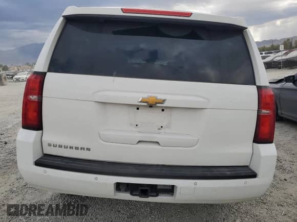 2015 Chevrolet Suburban LT with VIN 1GNSKJKC2FR638276, listed as a Copart auction lot 85897235 with 229,596 mi miles and Salvage title. Bid and sale history available at DreamBid. Image 6.