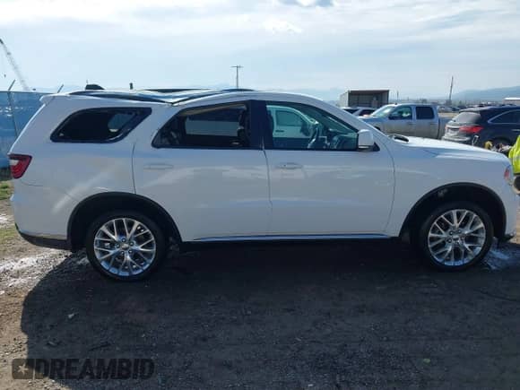 2016 Dodge Durango Limited with VIN 1C4RDJDG7GC477302, listed as a IAAI auction lot 42004636 with 61,893 mi miles and . Bid and sale history available at DreamBid. Image 13.