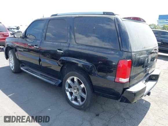 2004 Cadillac Escalade z VIN 1GYEK63N14R234928, wystawiony jako IAAI lot #43195673 z przebiegiem 73 814 mil mil oraz . Historia ofert i sprzedaży dostępna na DreamBid. Obrazek 3.