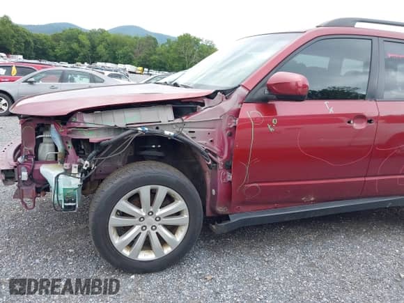 2011 Subaru Forester X Premium z VIN JF2SHADC9BG742436, wystawiony jako IAAI lot #42774895 z przebiegiem 218 696 mil mil oraz . Historia ofert i sprzedaży dostępna na DreamBid. Obrazek 13.