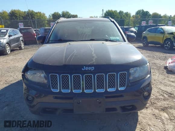 2014 Jeep Compass Latitude with VIN 1C4NJDEB8ED661117, listed as a IAAI auction lot 43368488 with 74,122 mi miles and . Bid and sale history available at DreamBid. Image 13.