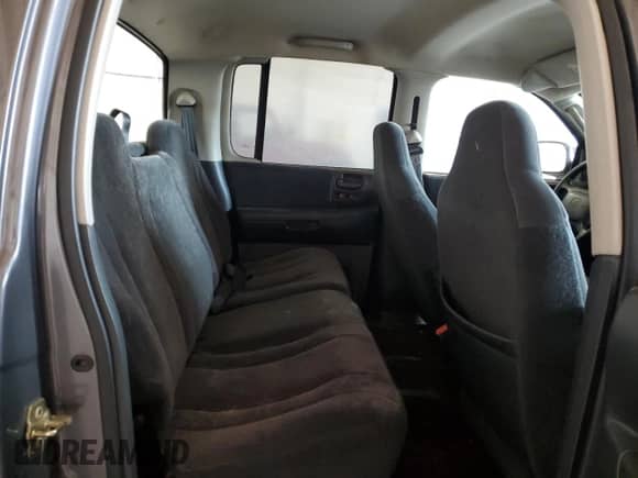 2004 Dodge Dakota Sport z VIN 1D7HL38N54S536938, wystawiony jako Copart lot #52455345 z przebiegiem 157 791 mil mil oraz Szkoda całkowita • Salvage title. Historia ofert i sprzedaży dostępna na DreamBid. Obrazek 10.