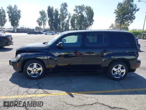 2010 Chevrolet HHR 1LT with VIN 3GNBABDB8AS525273, listed as a IAAI auction lot 43379241 with 90,635 mi miles and . Bid and sale history available at DreamBid. Image 14.