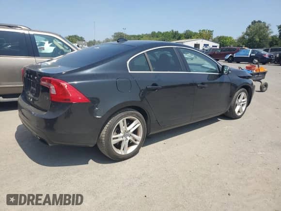 2015 Volvo S60 T5 Drive-E Premier with VIN YV140MFK6F2336518, listed as a Copart auction lot 68339405 with 142,401 mi miles and Salvage title. Bid and sale history available at DreamBid. Image 3.