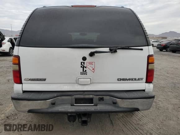 2003 Chevrolet Tahoe Z71 z VIN 1GNEK13T33R281200, wystawiony jako Copart lot #81435385 z przebiegiem Nie podano mil oraz Szkoda całkowita • Salvage title. Historia ofert i sprzedaży dostępna na DreamBid. Obrazek 6.
