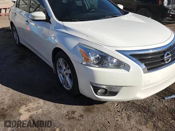 2015 Nissan Altima SV с VIN 1N4AL3AP7FC124370, выставлен на аукционе Copart как лот 82210035 с пробегом 127 617 миль миль и Списание • Salvage title. История ставок и продаж доступна на DreamBid. Изображение 13.