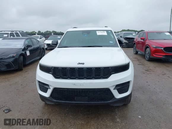 2023 Jeep Grand Cherokee Altitude with VIN 1C4RJGAG0PC610160, listed as a IAAI auction lot 42720286 with 30,456 mi miles and . Bid and sale history available at DreamBid. Image 12.