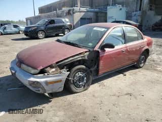 1997 Saturn SL with VIN 1G8ZF5285VZ412630, listed as a Copart auction lot 74937694 with 165,371 mi miles and Salvage title. Bid and sale history available at DreamBid. Image 1.