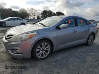 2012 Hyundai Azera с VIN KMHFG4JG2CA150100, выставлен на аукционе Copart как лот 84108424 с пробегом 146 930 миль миль и Списание • Salvage title. История ставок и продаж доступна на DreamBid. Изображение 1.