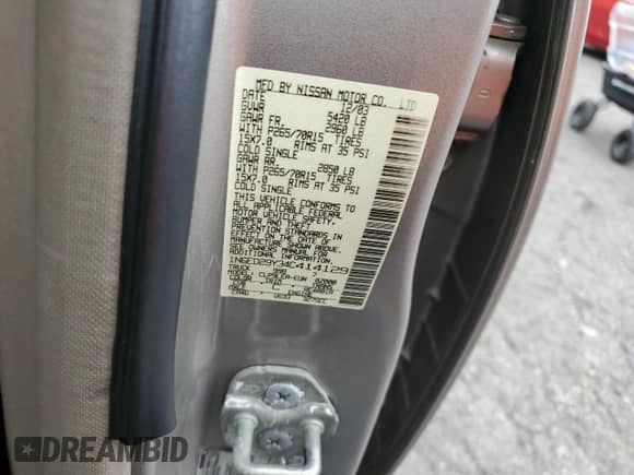 2004 Nissan Frontier XE z VIN 1N6ED29Y34C414129, wystawiony jako Copart lot #73254724 z przebiegiem 247 106 mil mil oraz Szkoda całkowita • Salvage title. Historia ofert i sprzedaży dostępna na DreamBid. Obrazek 14.