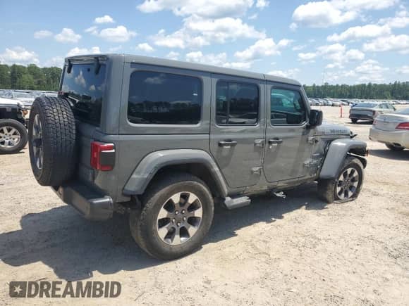 2021 Jeep Wrangler Unlimited Sahara with VIN 1C4HJXEN6MW590284, listed as a Copart auction lot 61804035 with 74,789 mi miles and Salvage title. Bid and sale history available at DreamBid. Image 3.