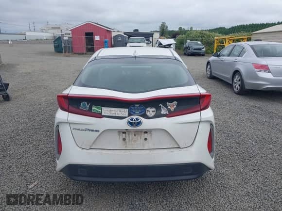 2018 Toyota Prius Plus z VIN JTDKARFP9J3095575, wystawiony jako IAAI lot #42408526 z przebiegiem 166 914 mil mil oraz . Historia ofert i sprzedaży dostępna na DreamBid. Obrazek 16.