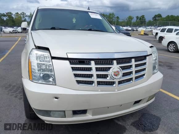 2011 Cadillac Escalade Premium z VIN 1GYS4CEF2BR128390, wystawiony jako IAAI lot #43371073 z przebiegiem 321 583 mil mil oraz . Historia ofert i sprzedaży dostępna na DreamBid. Obrazek 6.