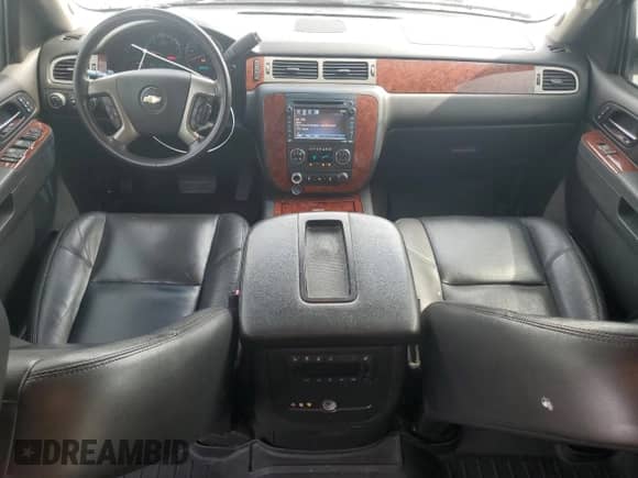 2014 Chevrolet Suburban LTZ with VIN 1GNSKKE70ER237697, listed as a Copart auction lot 60029745 with 86,469 mi miles and Salvage title. Bid and sale history available at DreamBid. Image 8.