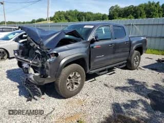 2022 Toyota Tacoma SR with VIN 3TMCZ5AN1NM502157, listed as a Copart auction lot 63388555 with 42,376 mi miles and Salvage title. Bid and sale history available at DreamBid. Image 1.