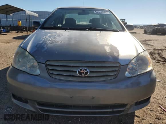 2003 Toyota Corolla CE с VIN 1NXBR32E83Z033572, выставлен на аукционе Copart как лот 82466225 с пробегом 228 151 миль миль и Списание • Salvage title. История ставок и продаж доступна на DreamBid. Изображение 5.