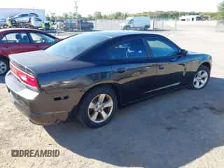 2011 Dodge Charger SE with VIN 2B3CL3CG4BH511693, listed as a IAAI auction lot 43348763 with 218,069 mi miles and . Bid and sale history available at DreamBid. Image 4.